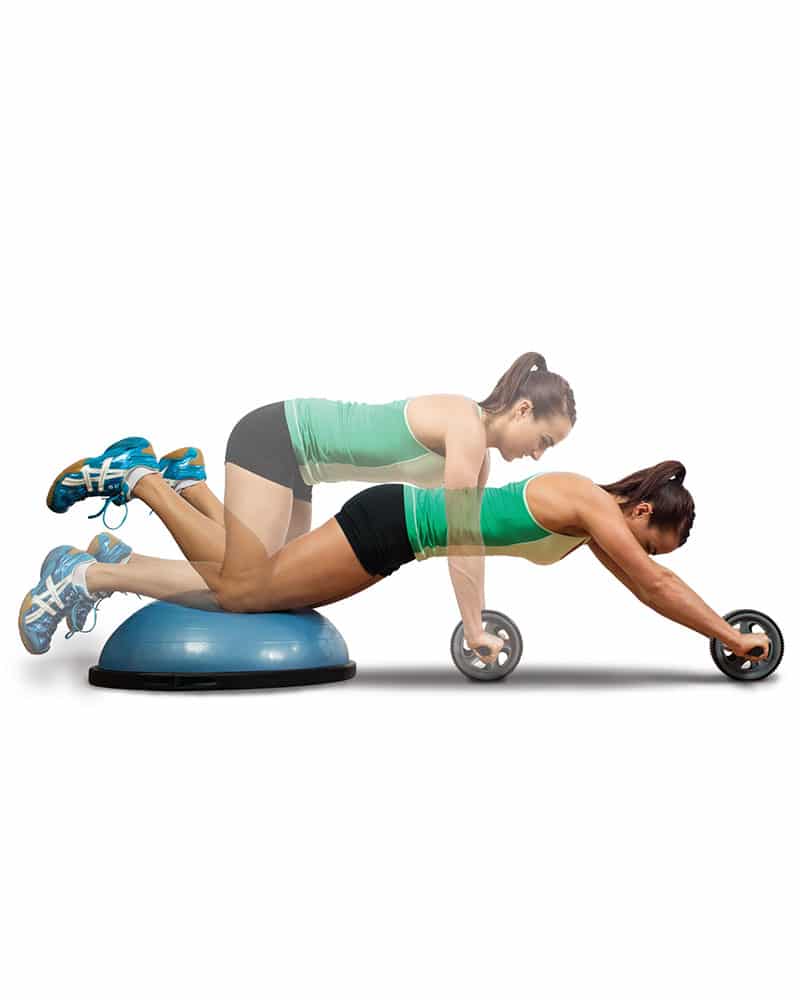 Woman exercising with BOSU and Double Ab Wheel