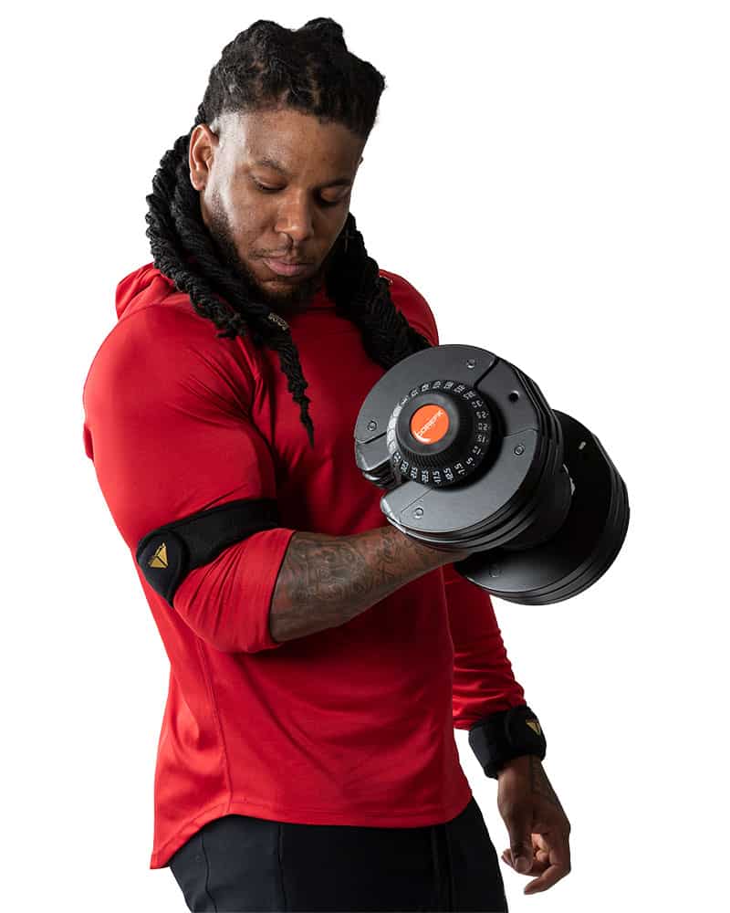 Man doing bicep curl with Adjustable Dumbbell Set