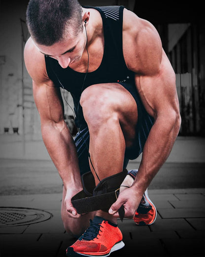 Man doing up COREFX ankle weights