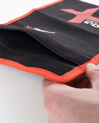 hand showing the opening of a COREFX Workout Sandbag Filler Bag