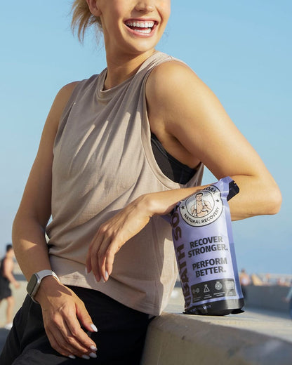 Female athlete leaning on coach soak bath soak bag