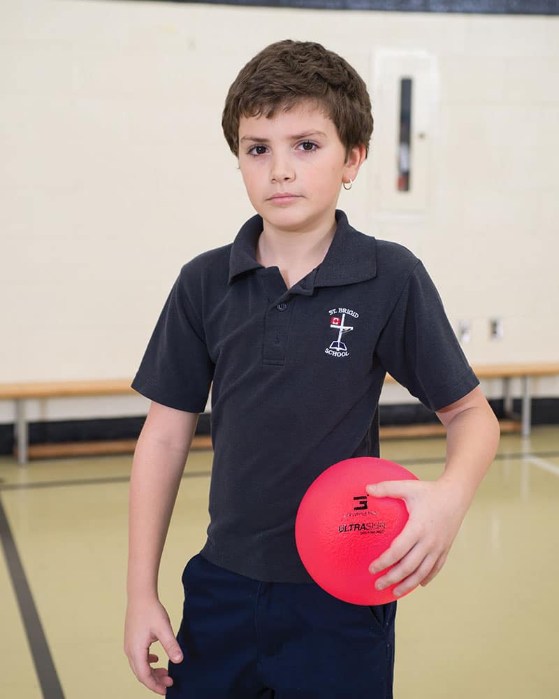Neon Ultraskin Ball with boy in physical education class