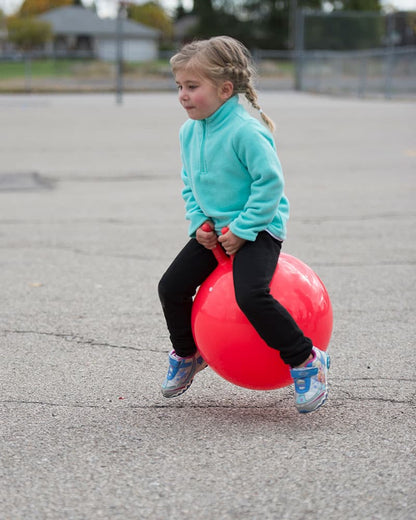 Girl bouncing on economy hop ball