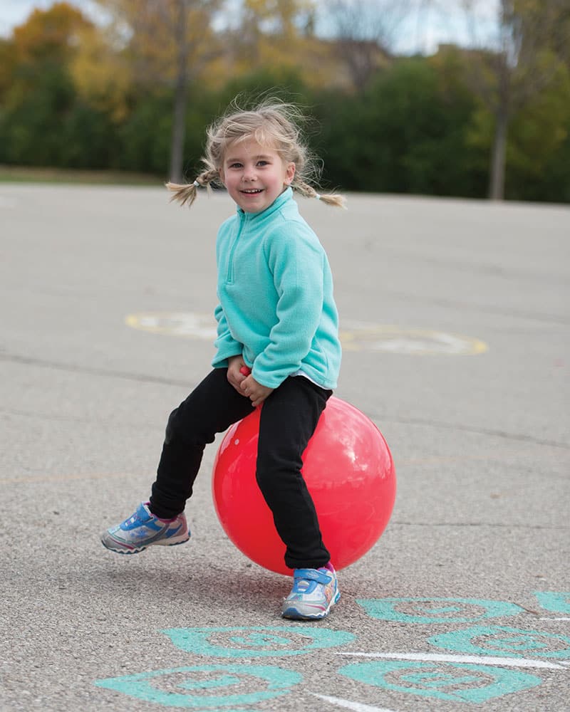 playground child with hop ball
