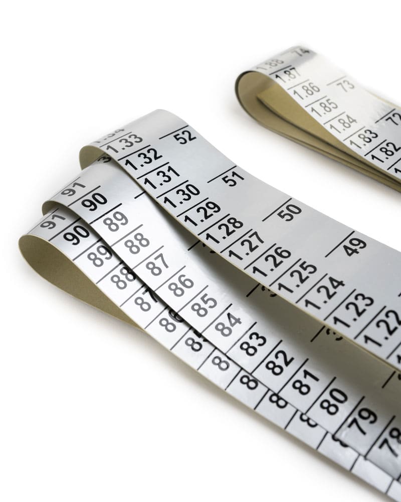 Close-up of Inches and Meters measurements on replacement high jump labels