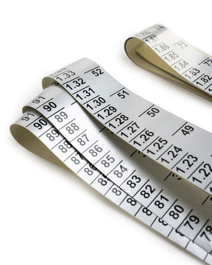 Close-up of Inches and Meters measurements on replacement high jump labels