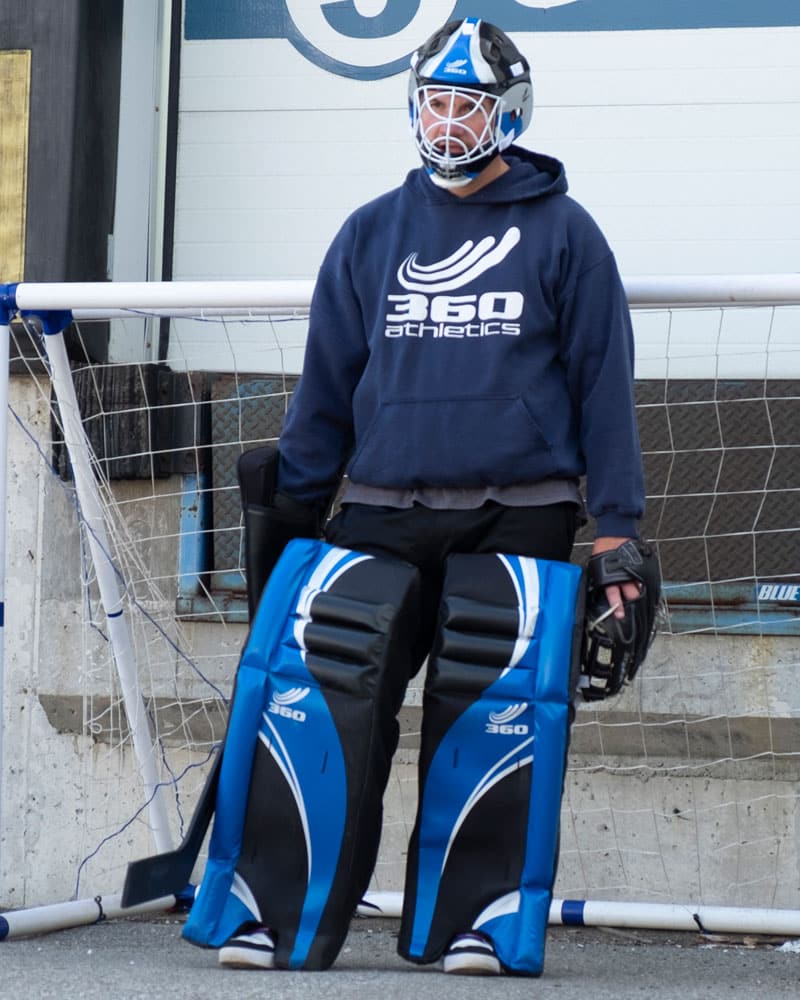 Man wearing Goalie Leg Pads Senior