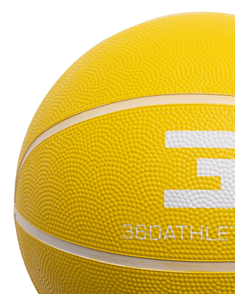 Close up of yellow playground basketball