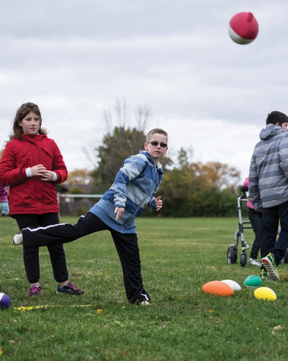 Little Boy Throwing Mini Coated Foam Football