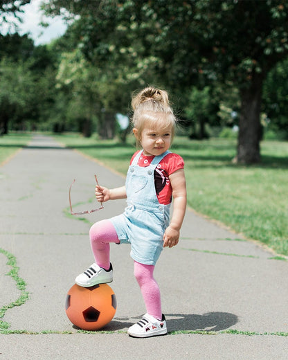 Girl with Orange Soccer Ball from Sports Kit
