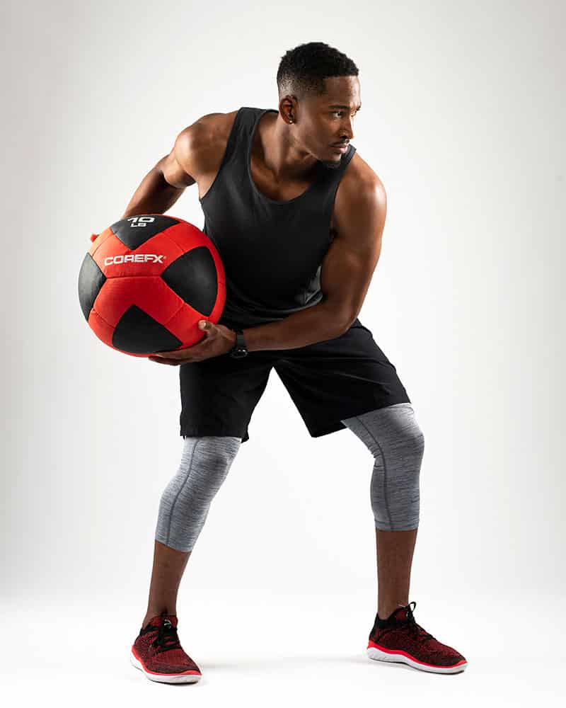 Athlete using the COREFX 10 pound Wall Ball