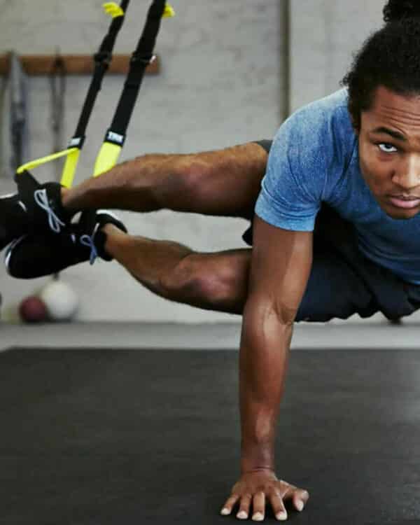 athlete with home suspension trainer